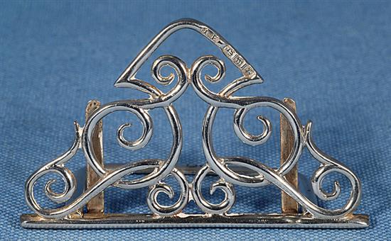 A set of four silver Art Nouveau folding design menu holders, Width 2 ¾” x Height 1 5/8”/42mm Total weight 3oz/84grm